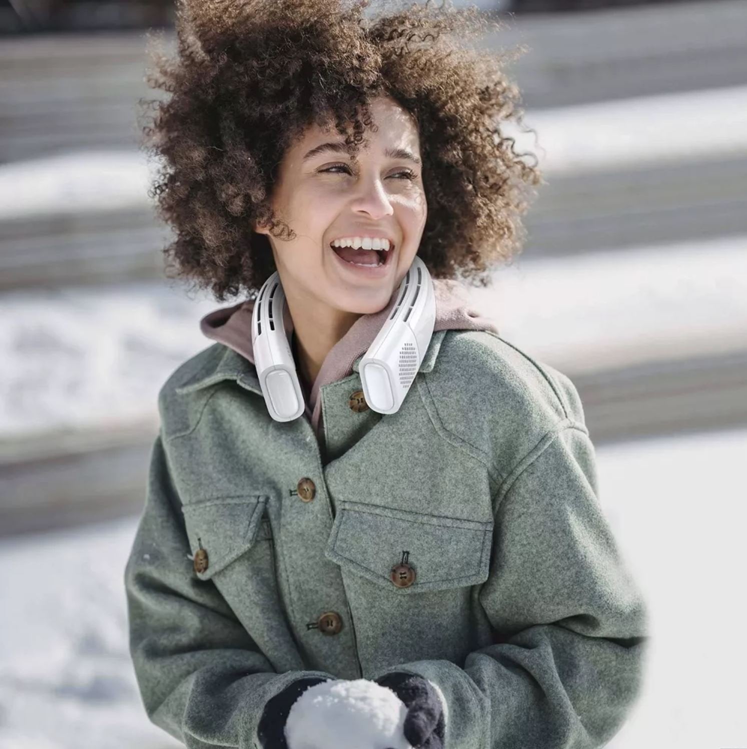 Person wearing the Coolify 2 wearable air conditioner and warmer outdoors